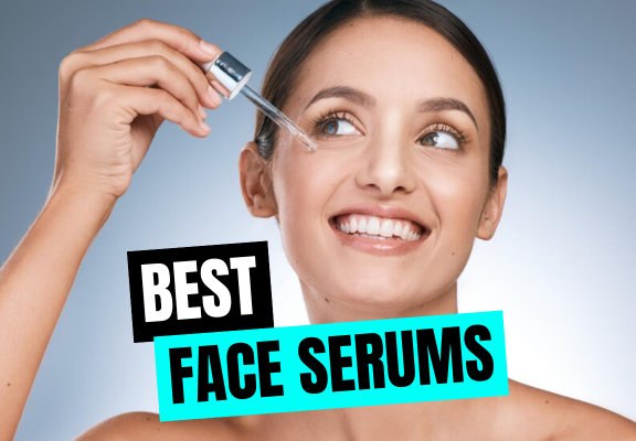 Girl smiling while using face serum.